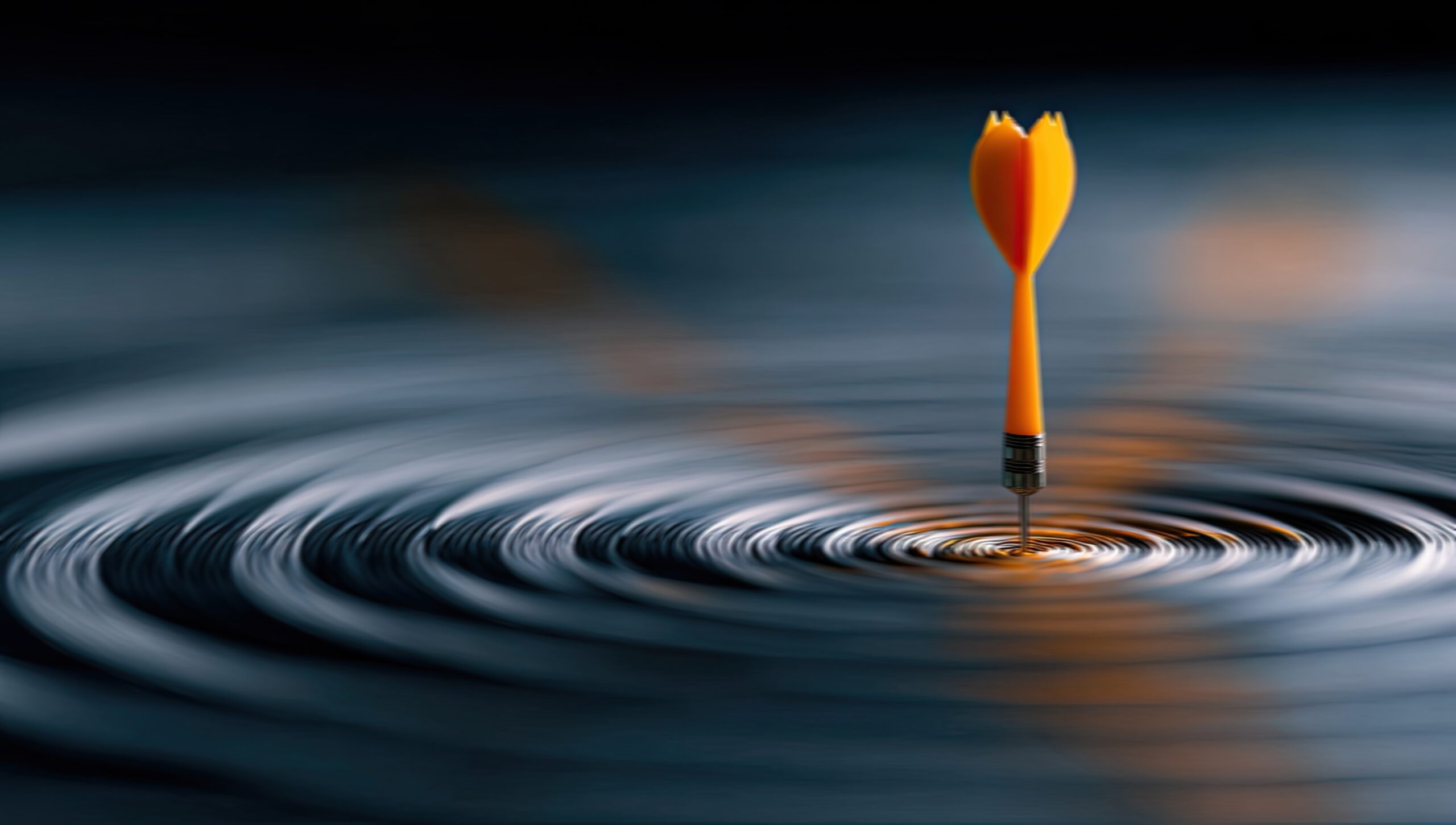 a,single,dart,hitting,the,center,of,a,target,creating